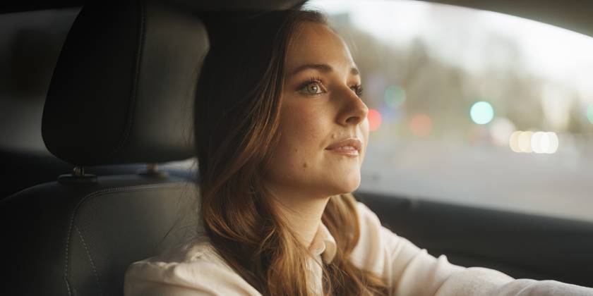 Driver looking into rear view mirror